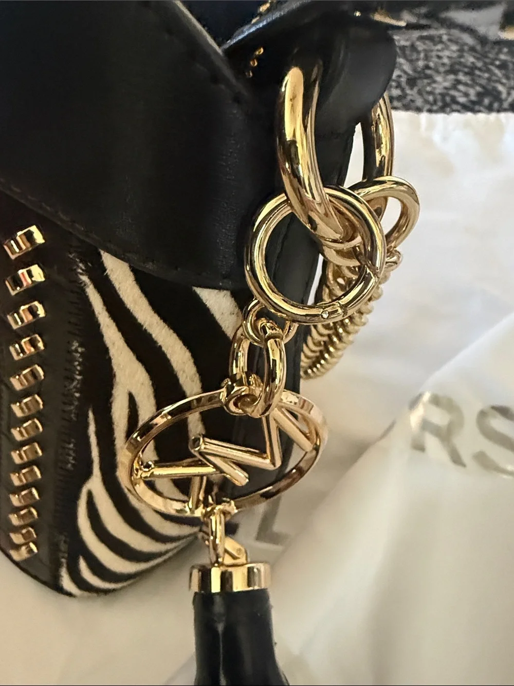 Michael Kors Black Zebra Leopard Crossbody with Red Stripes